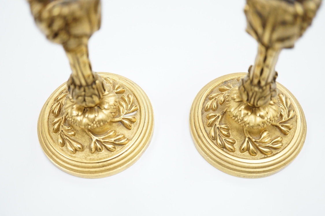 A pair of 19th century French ormolu candlesticks, stamped Le Maire Demouy a Paris 13cm high